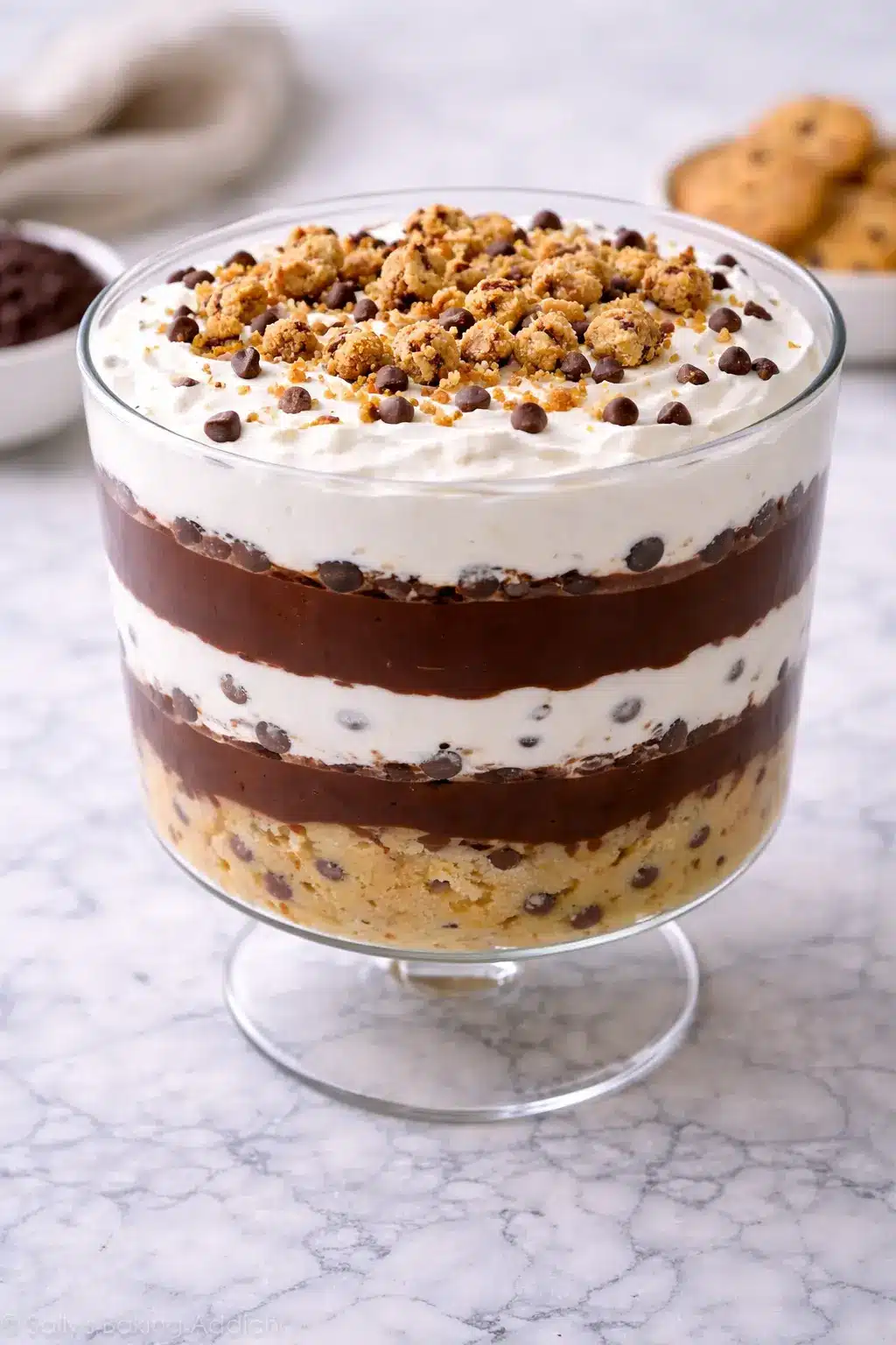 Cookie Dough Trifle layered with cookie dough, chocolate pudding, and whipped cream in a glass dish, ready to serve