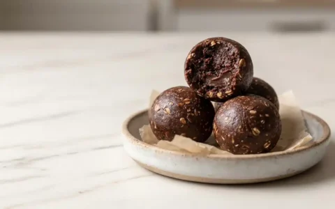 Moose Farts Without Coconut, naturally plated on clean white marble, freshly cooked and ready to serve with natural side daylight.