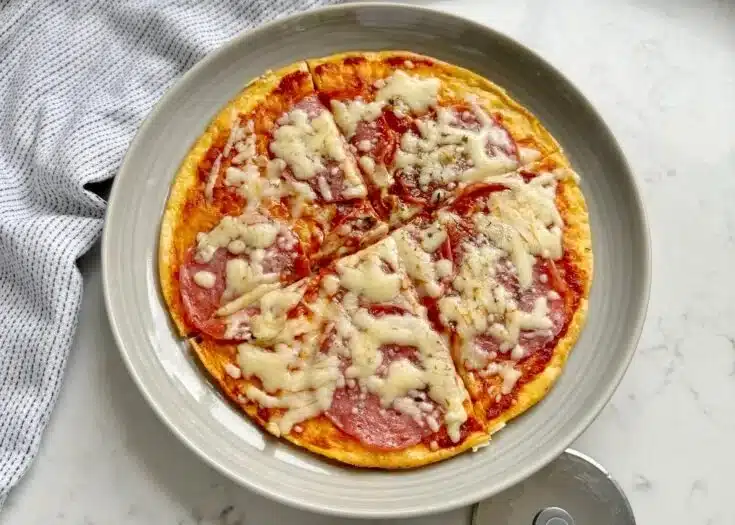 A delicious plate of Pizza Eggs featuring toppings like pepperoni and cheese.